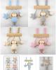 Hochet trap�ze avec petites peluches avec pouic rose