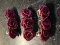 3 roses grenat sur barette